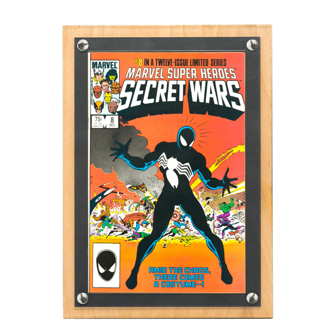 Photograph of the Crafti Comics Flex Frame for modern sized comic books with light wood backing and black paper mat, with 99% museum-quality UV-protection available. Crafti's laser-cut layered designs provide depth without creating pressure.